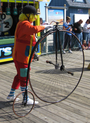 a clown with a bicycle